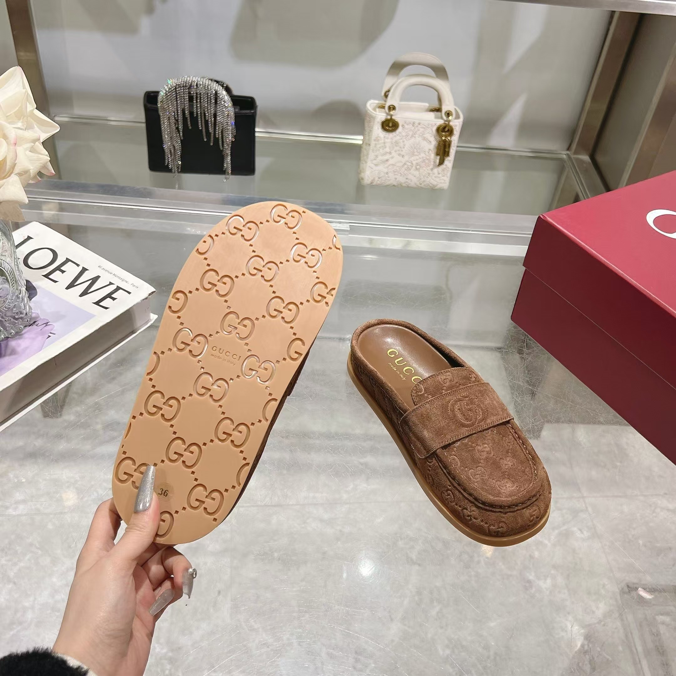 ABF Gucci Celia debossed suede mules