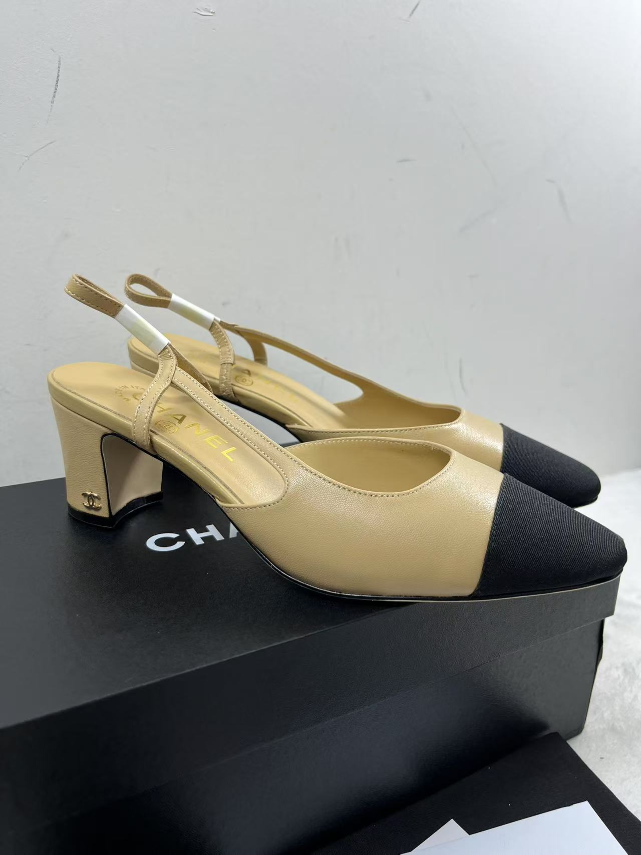 ABQ  CHANEL SLINGBACK CAP TOE HEELS BEIGE