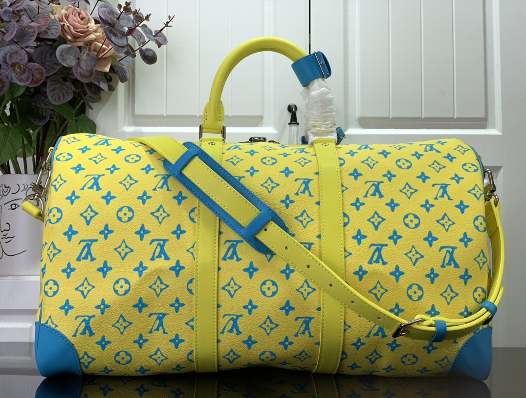 LV KEEPALL BANDOULIERE Yellow