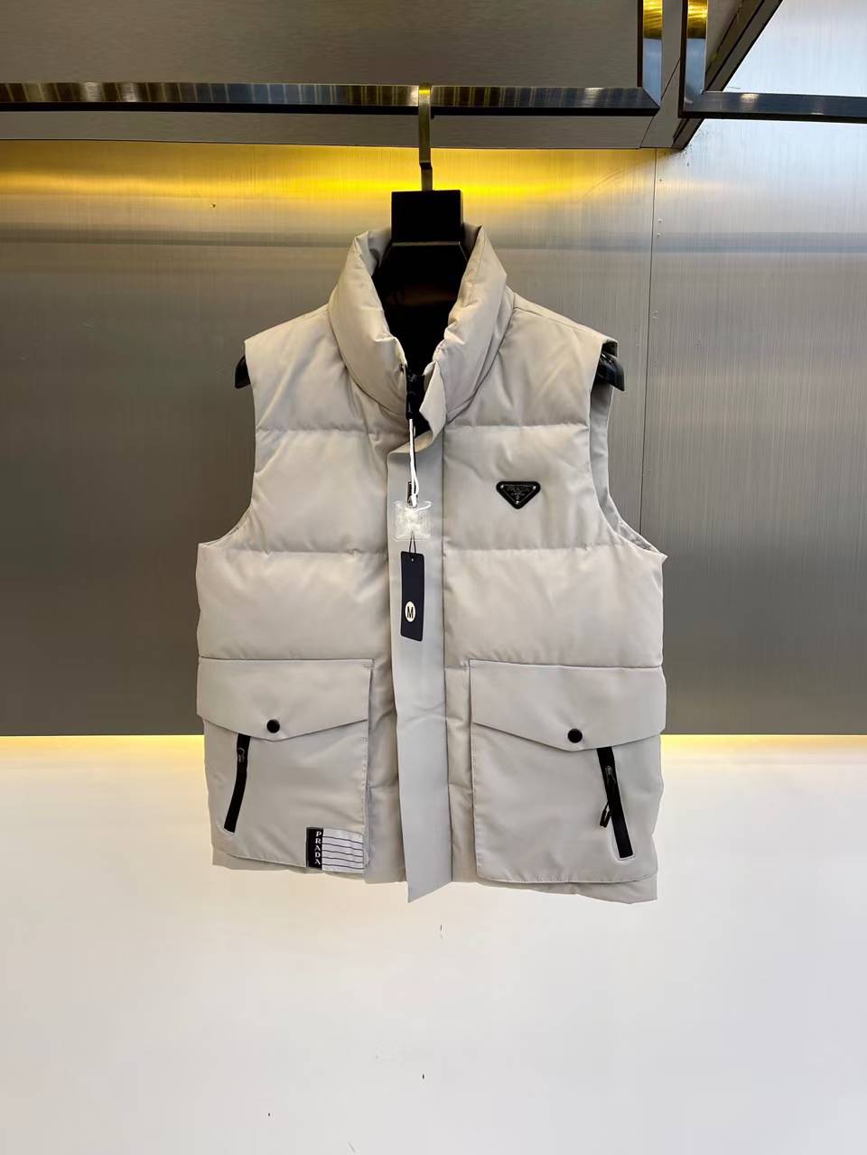 Prada down vest with logo in off-white