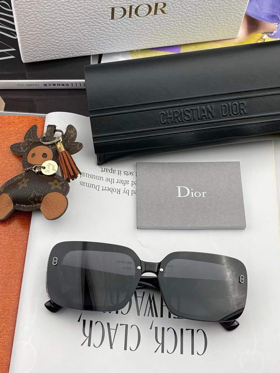 Christian Dior Womens Classy Narrow Rounded Rectangle Rimless Glitter Plastic Sunglasses