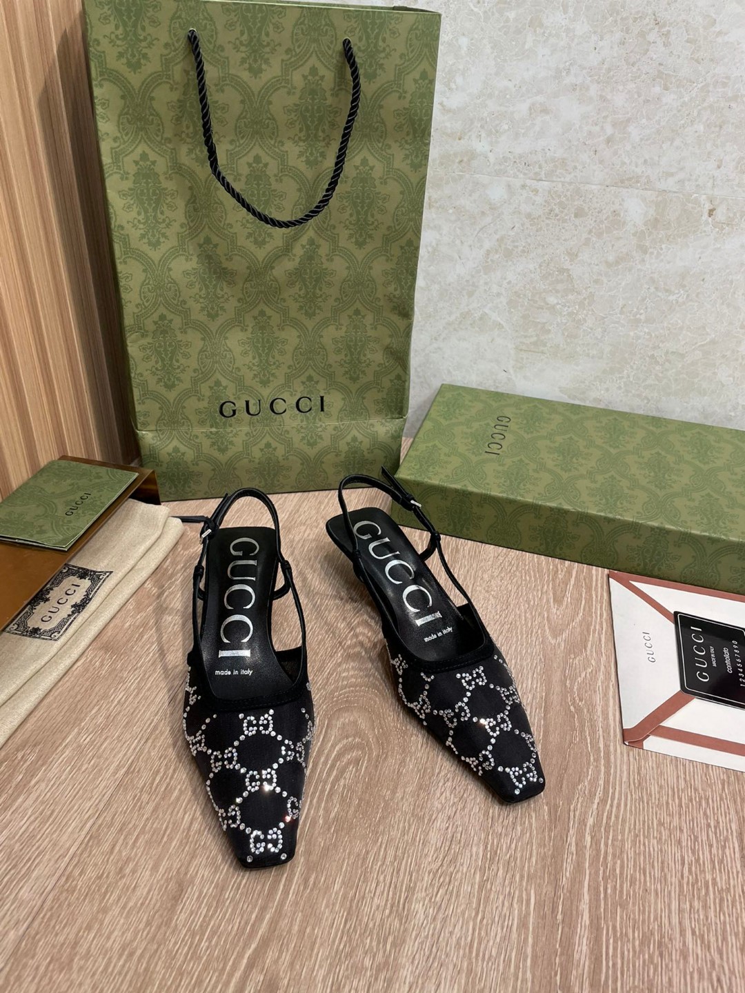 Gucci Womens GG crystal slingback pumps Black