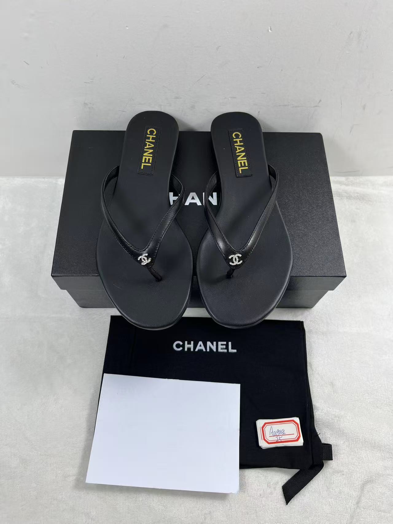 Chanel thong sandals Black size EU40 womens