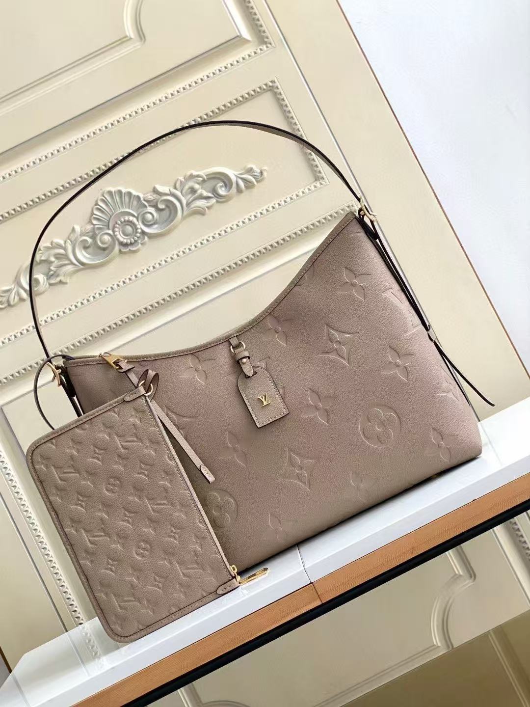LV M46292 CarryAll MM Tourterelle