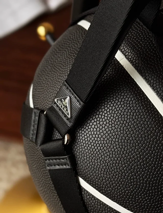 Prada dark black basketball with triangular metal side buckle