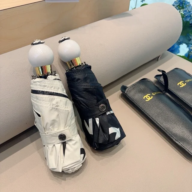 Chanel pearl handle 50% off manual folding umbrella