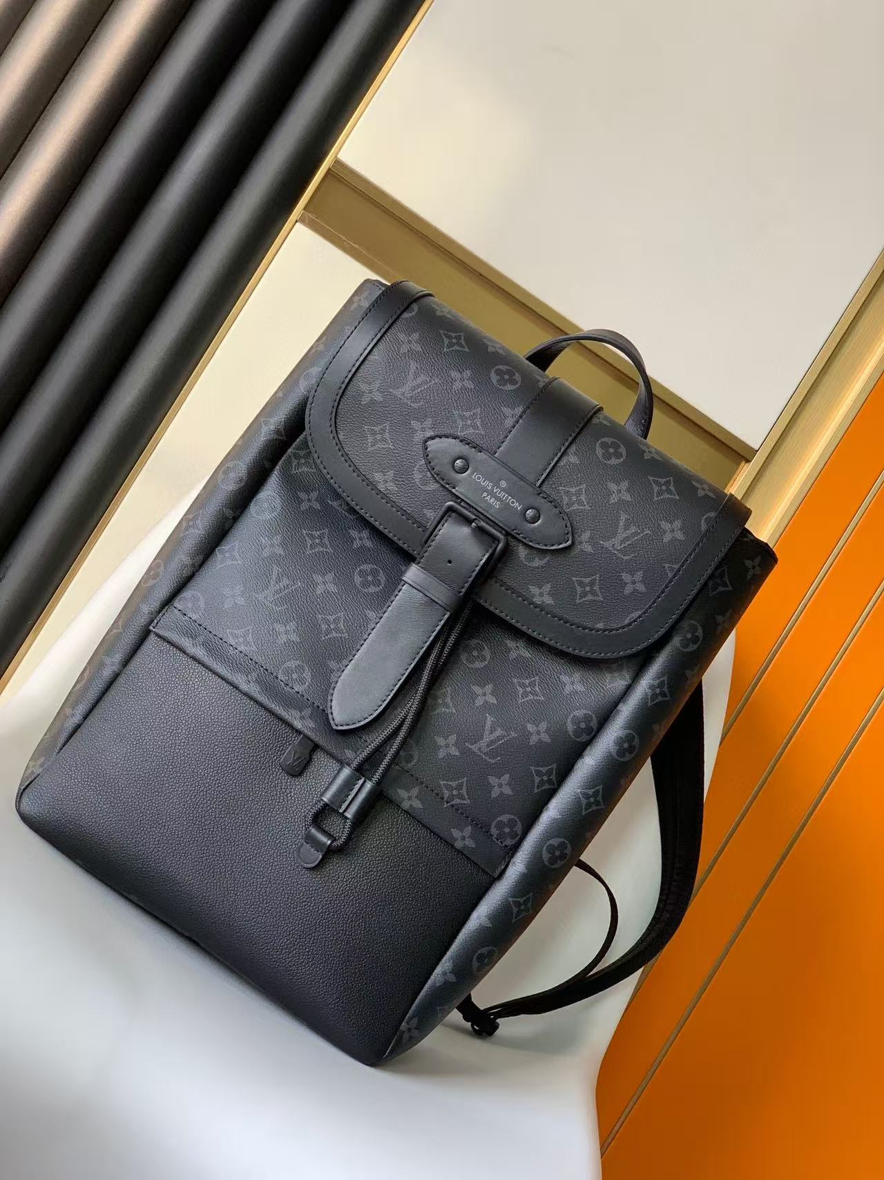 LV Saumur Backpack in Noir Monogram Eclipse canvas.
