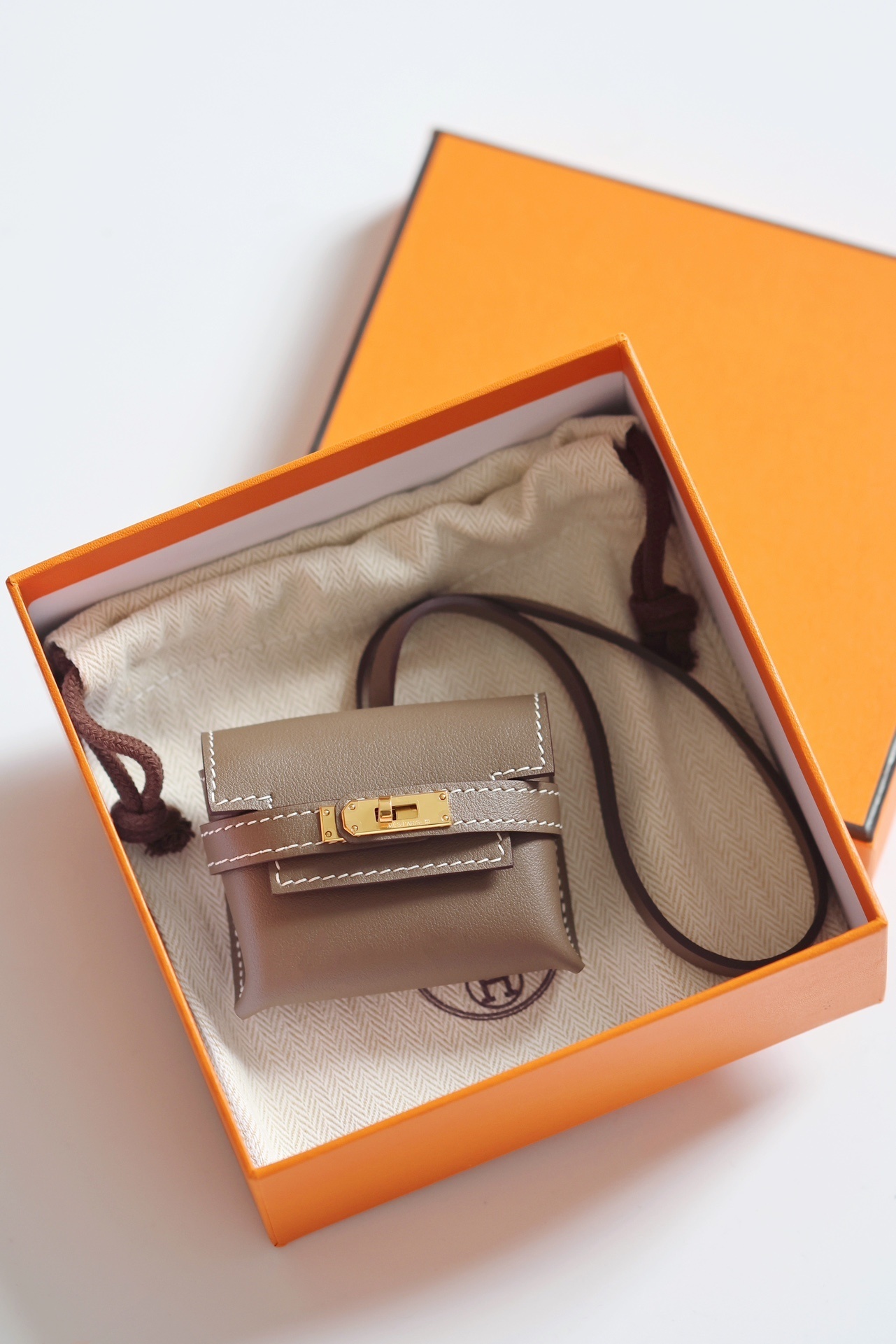 Hermes Kelly Festival Charm brown