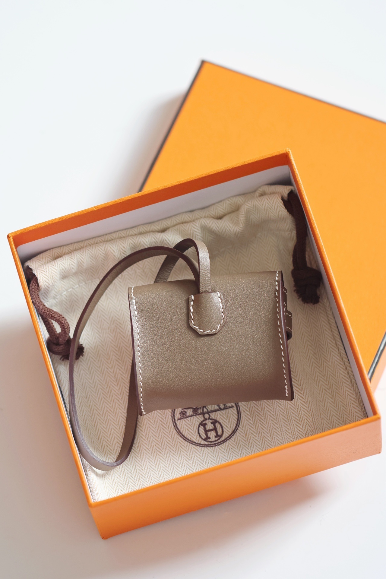 Hermes Kelly Festival Charm brown