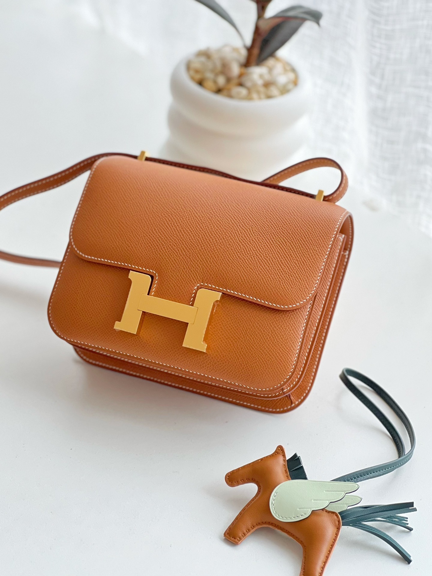 Hermes Constance bag in gold Epsom leather with a gold "H" clasp