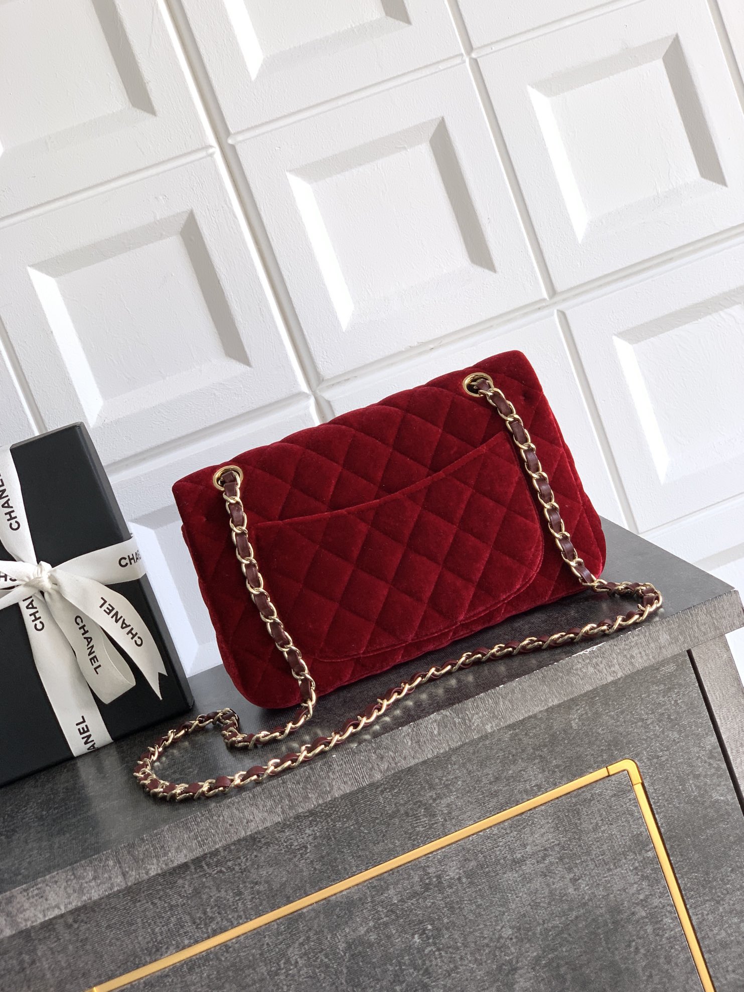 Chanel Mini Flap Bag in burgundy velvet diamante gold-tone metal hardware.