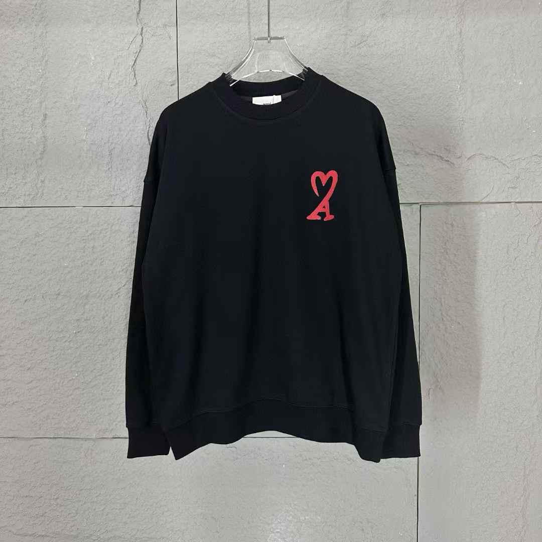 AMI Paris Ami de Coeur Sweatshirt in black with a red heart logo
