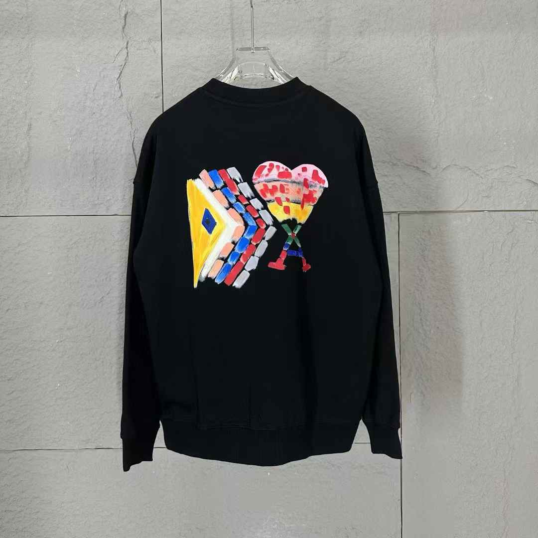 AMI Paris Ami de Coeur Sweatshirt in black with a red heart logo