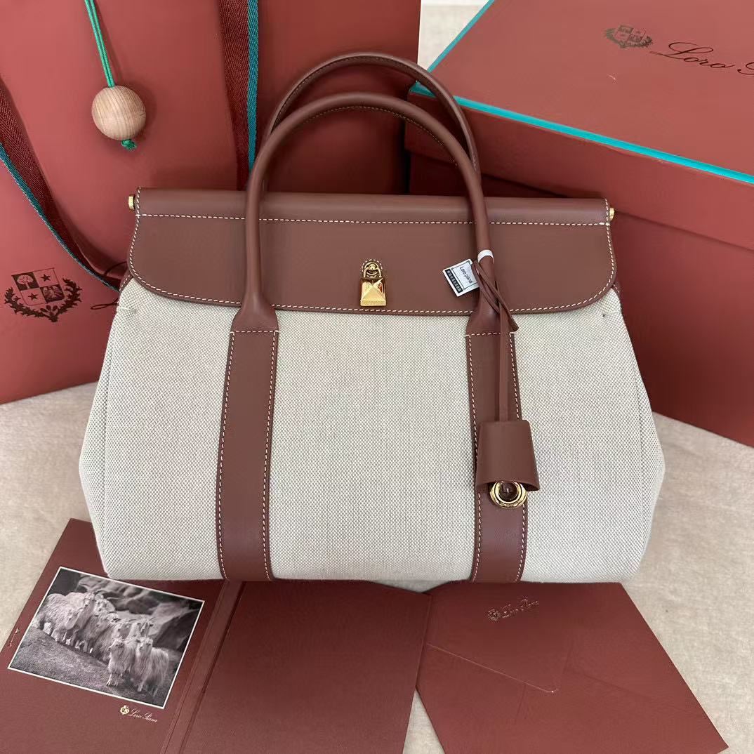 Loro Piana Loom L33 bag made with a combination of canvas and leather in a natural/caramel sugar color