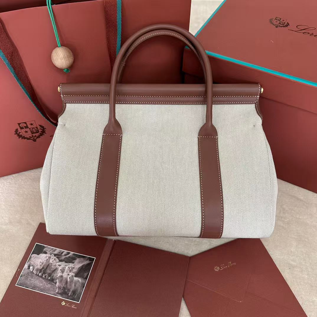 Loro Piana Loom L33 bag made with a combination of canvas and leather in a natural/caramel sugar color