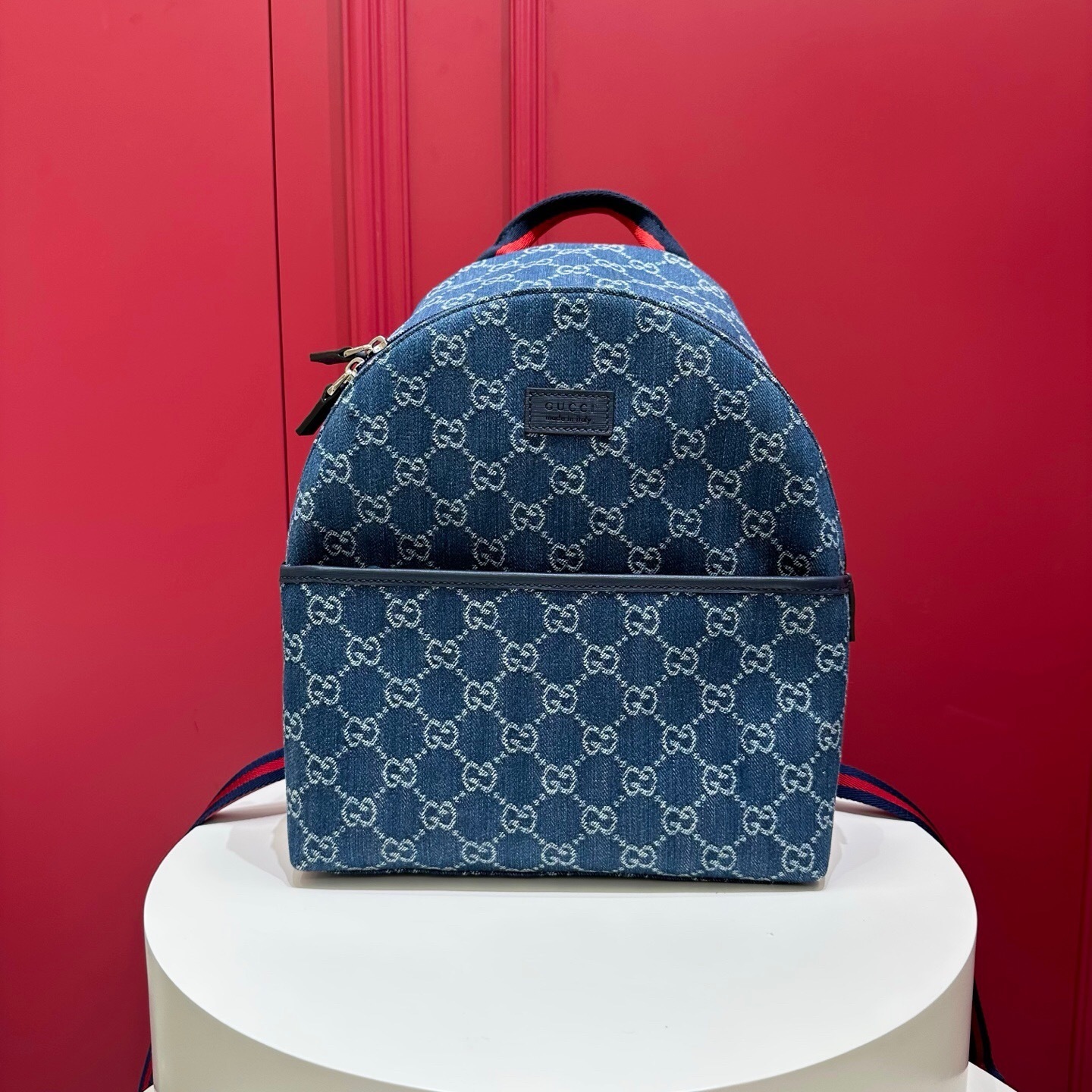 Gucci Kids GG Monogram Denim Backpack.