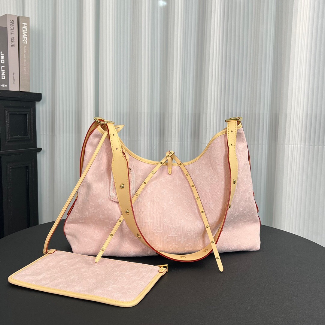 LV CarryAll PM Monogram handbag.