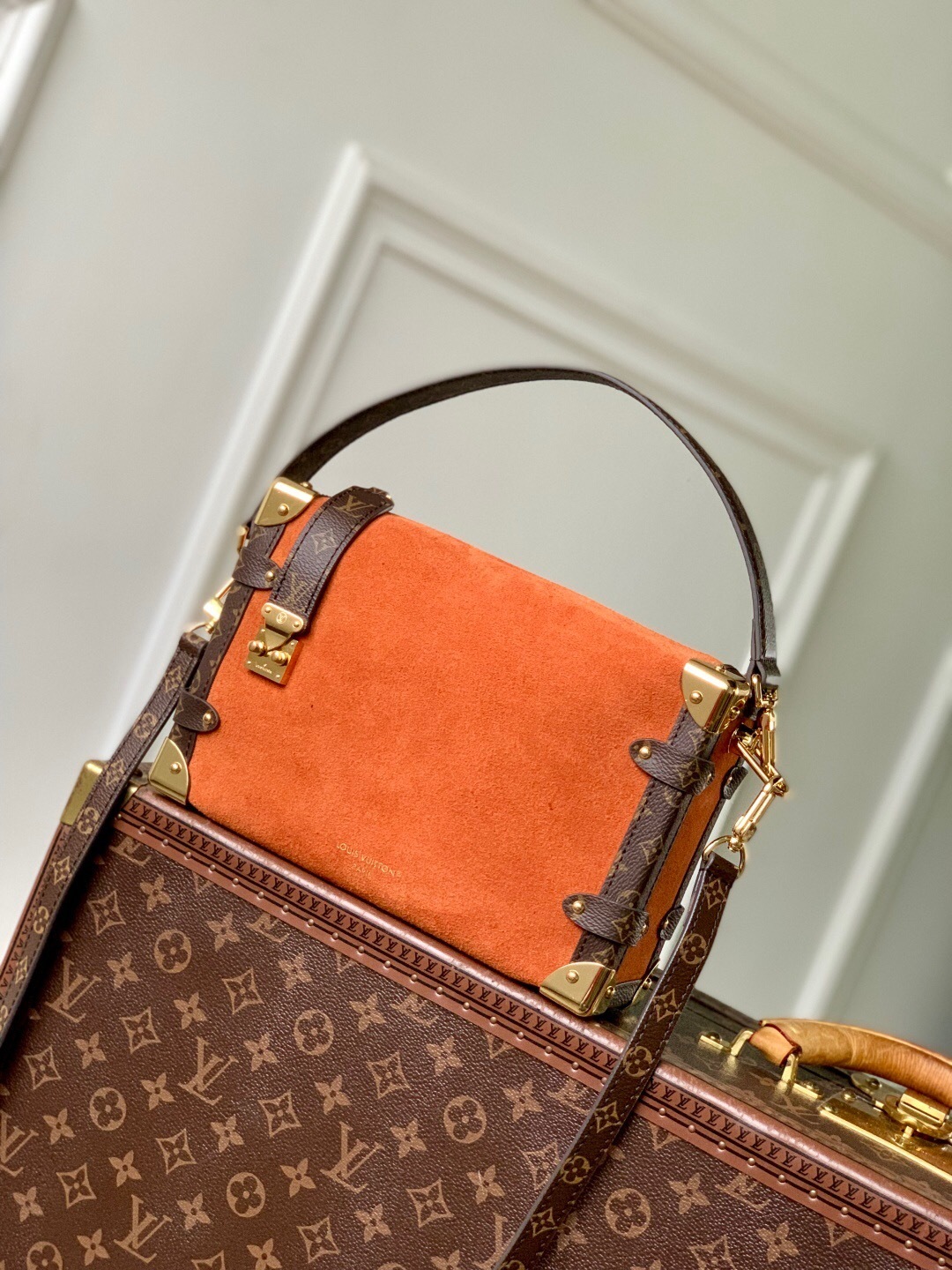 LV Side Trunk MM handbag in Monogram canvas with leather trim