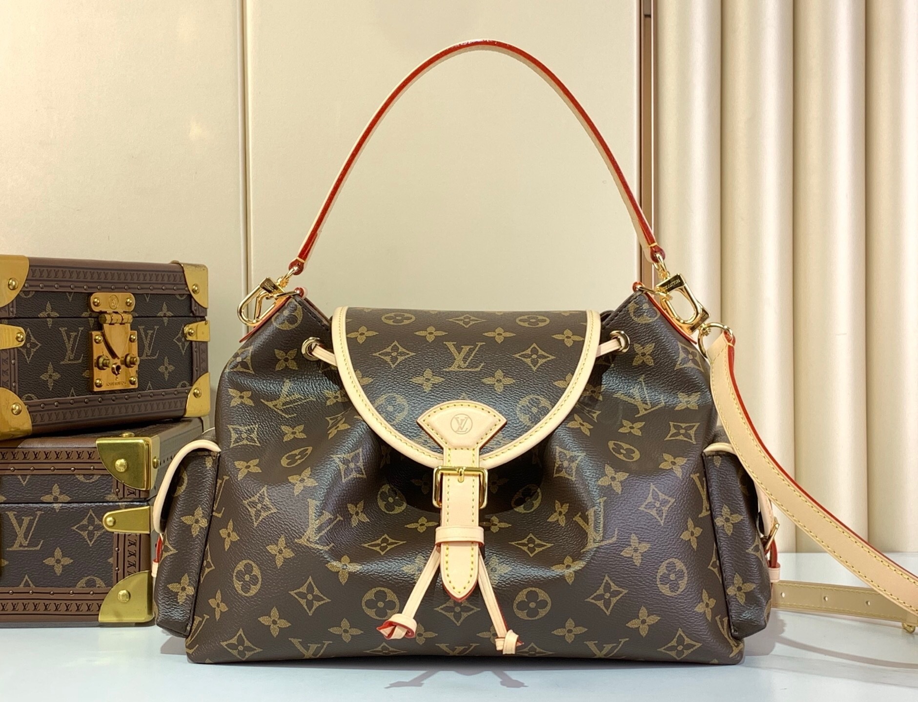 LV Odyssee MM Monogram handbag.