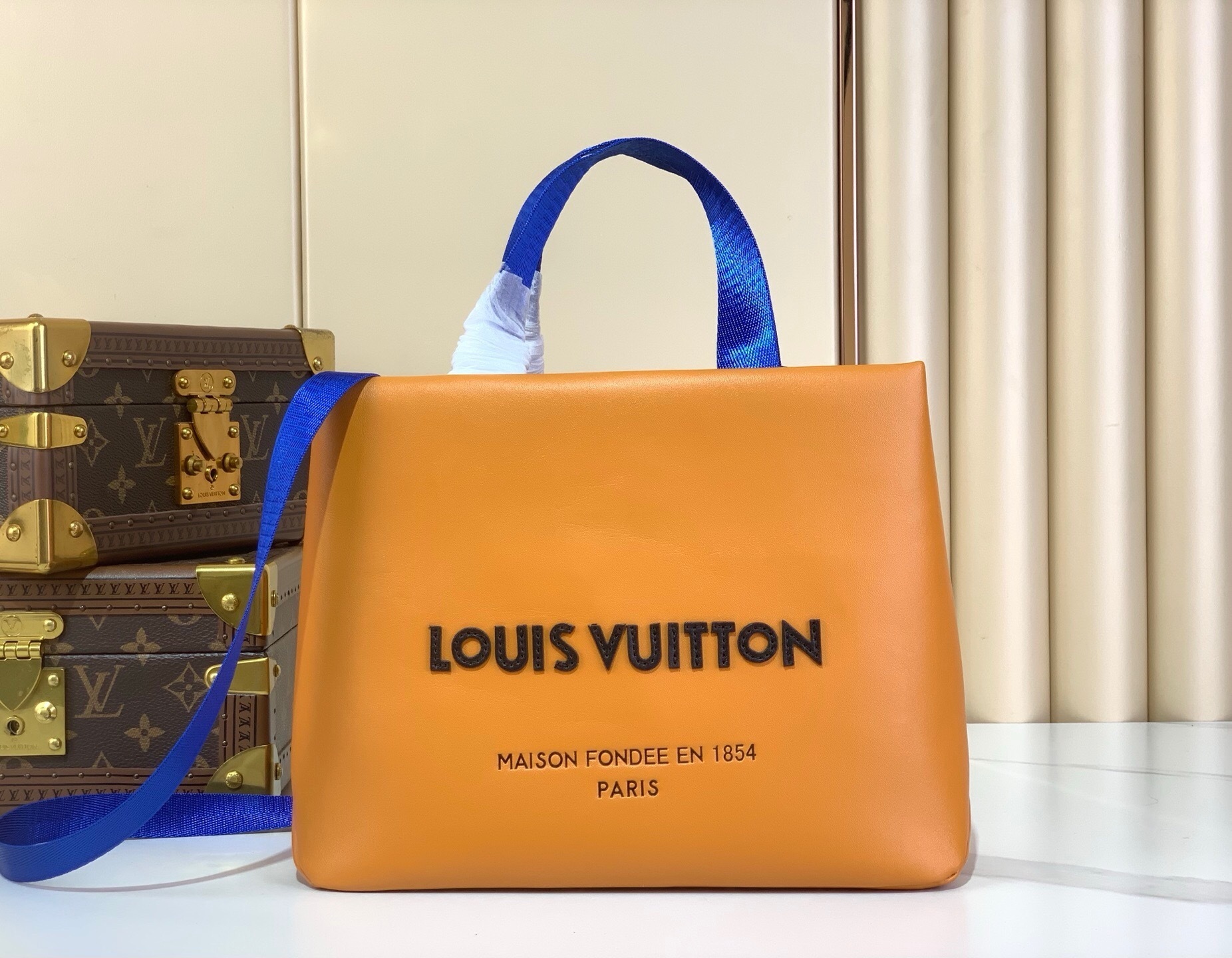 LV Mini Shopper Tote in saffron-colored cowhide leather