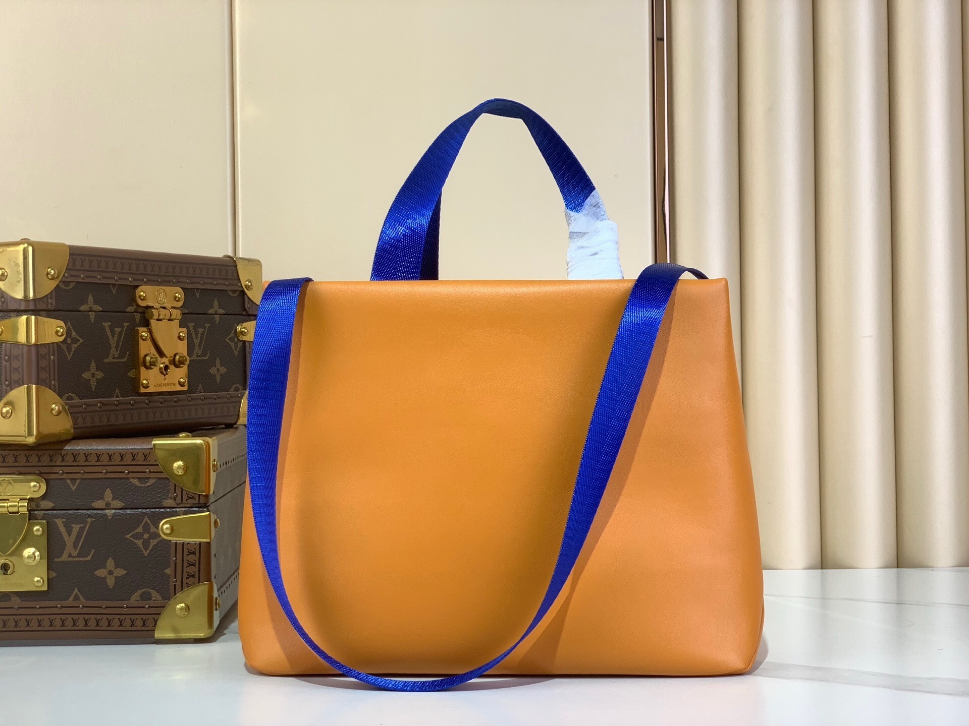LV Mini Shopper Tote in saffron-colored cowhide leather
