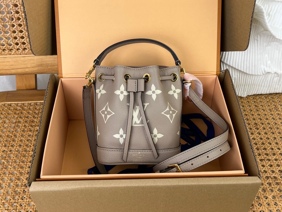 LV Nano Noe bag in bicolor Monogram Empreinte leather