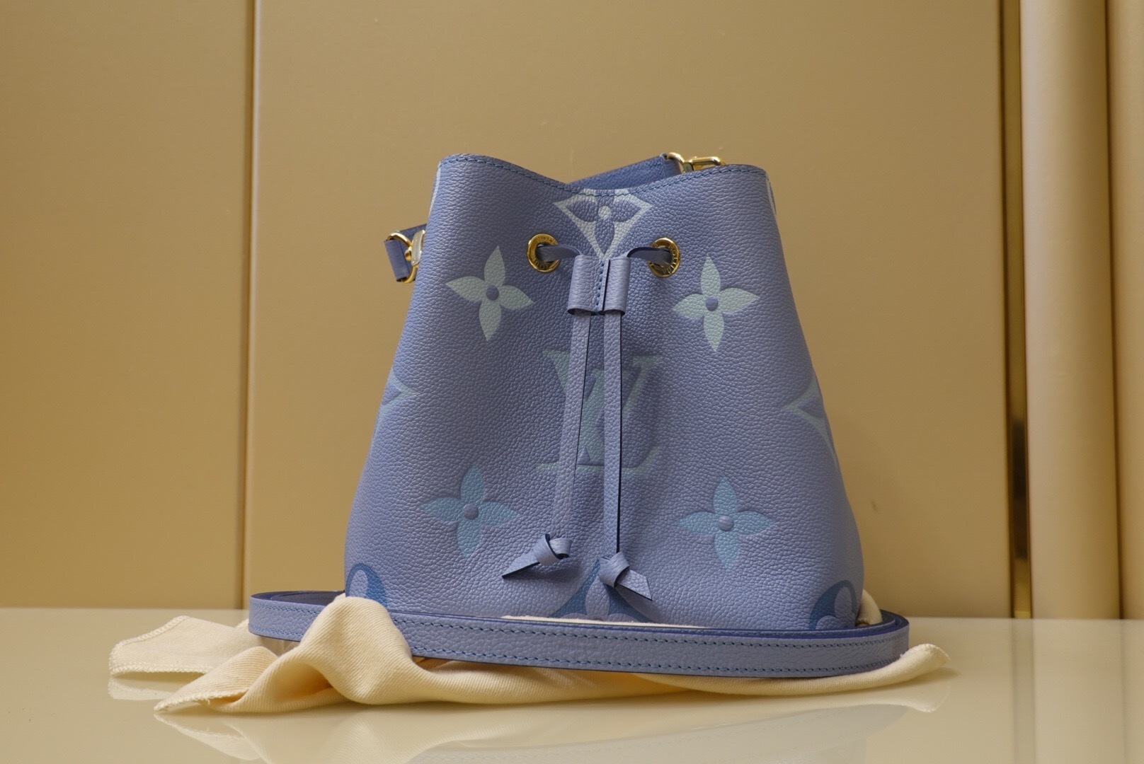 LV NeoNoe BB bag in Monogram Empreinte leather, in a summer blue color
