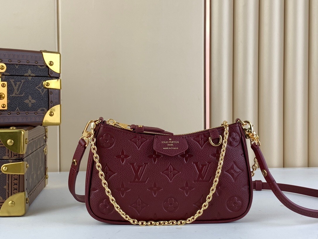 LV Easy Pouch On Strap in Monogram Empreinte leather.