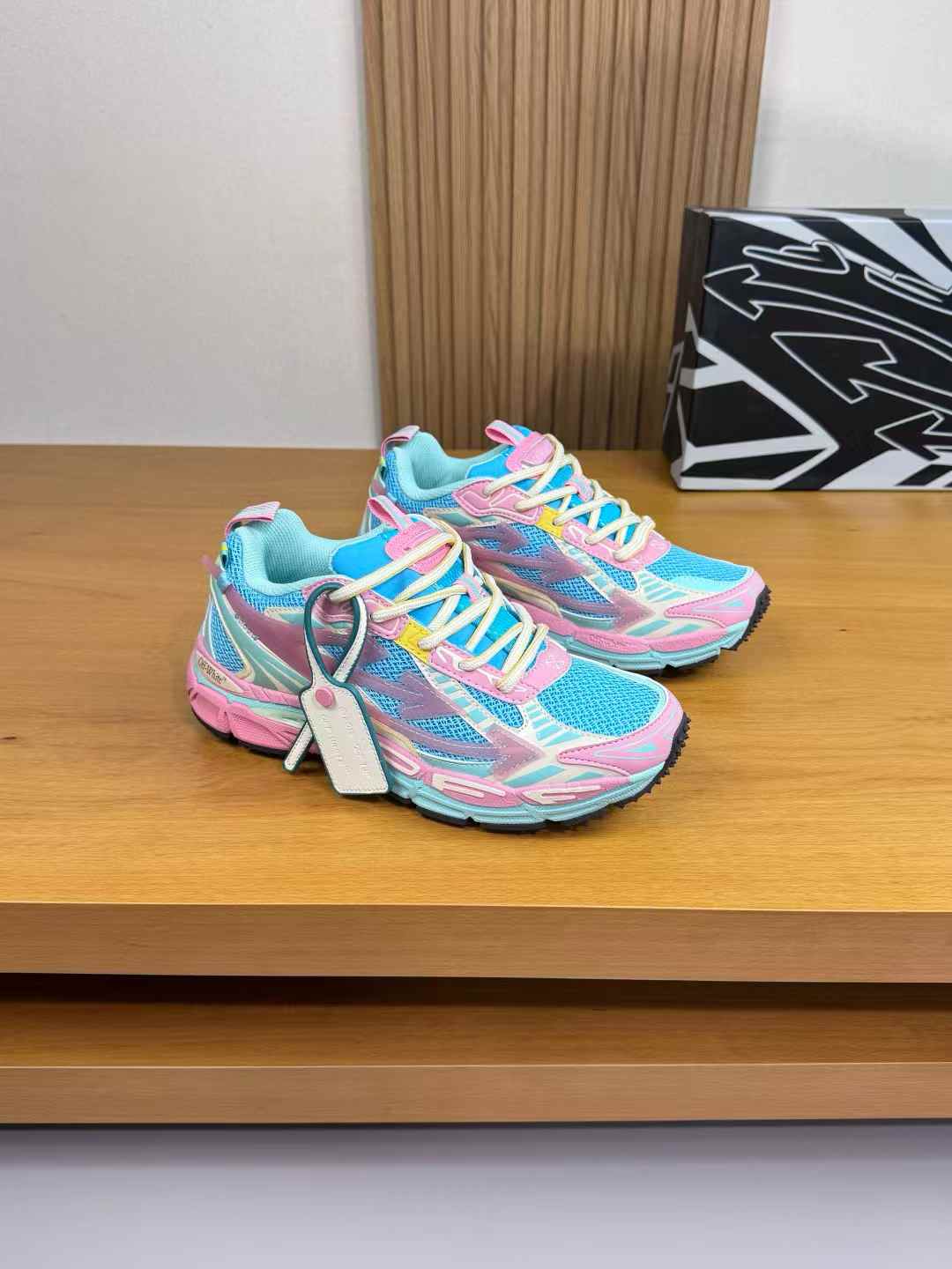 Off White Be Right Back sneakers in a light pink and turquoise blue colorway