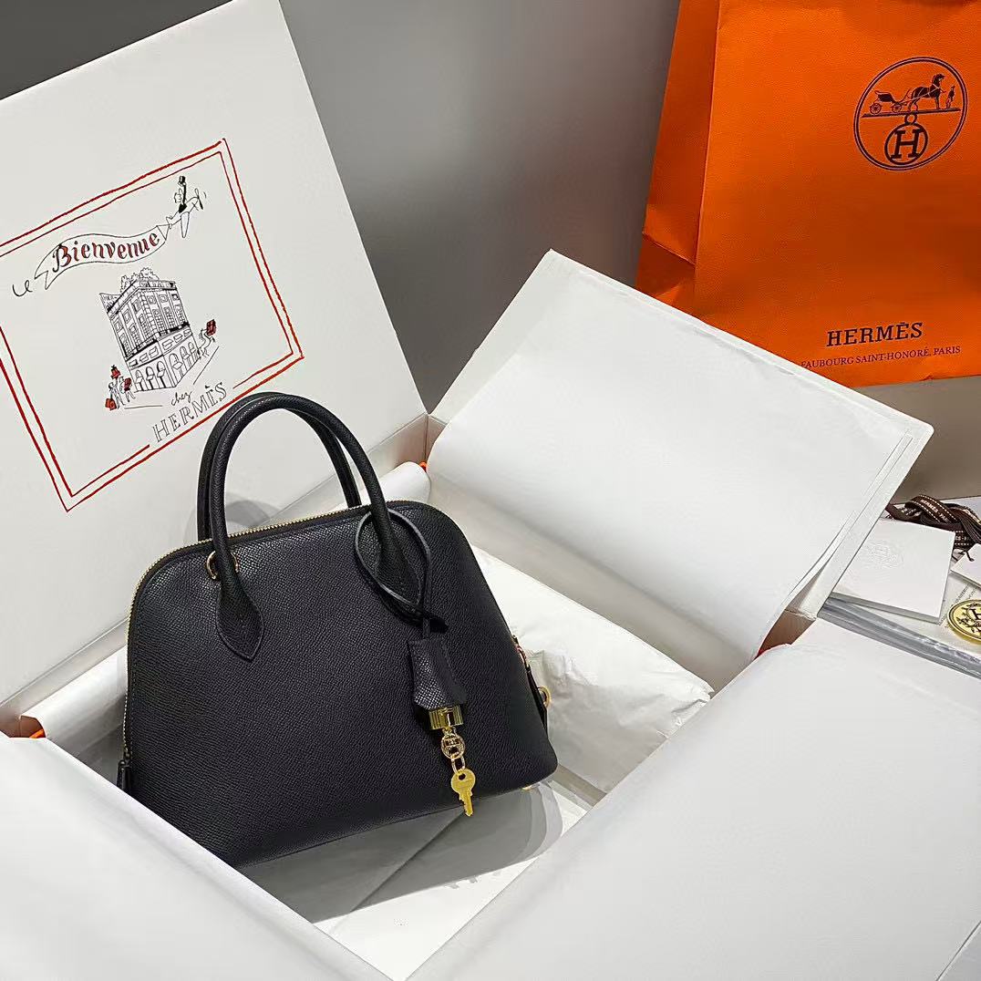 Hermes Bolide 25cm bag in black epsom leather with gold hardware.