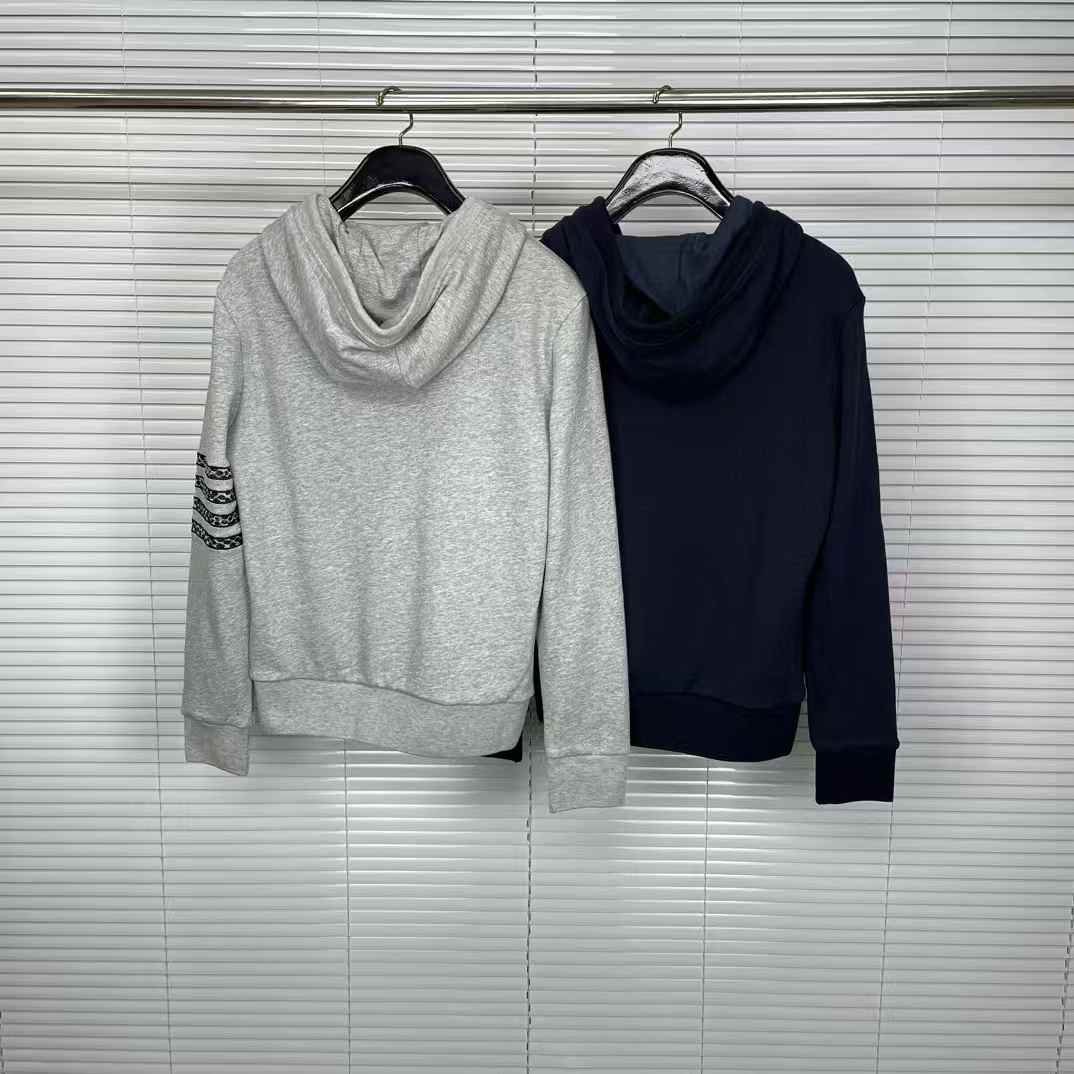Thom Browne Lunar New Year hoodie with a gold 4-bar snake design
