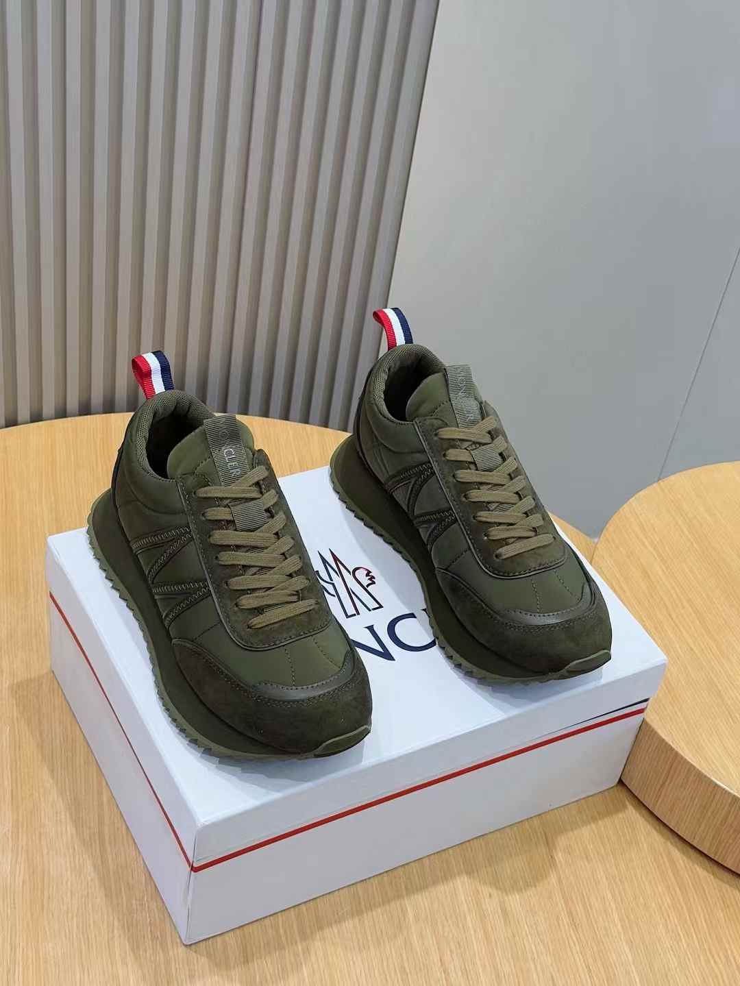 Moncler Trailgrip GTX Lite low-top sneakers in a green colorway