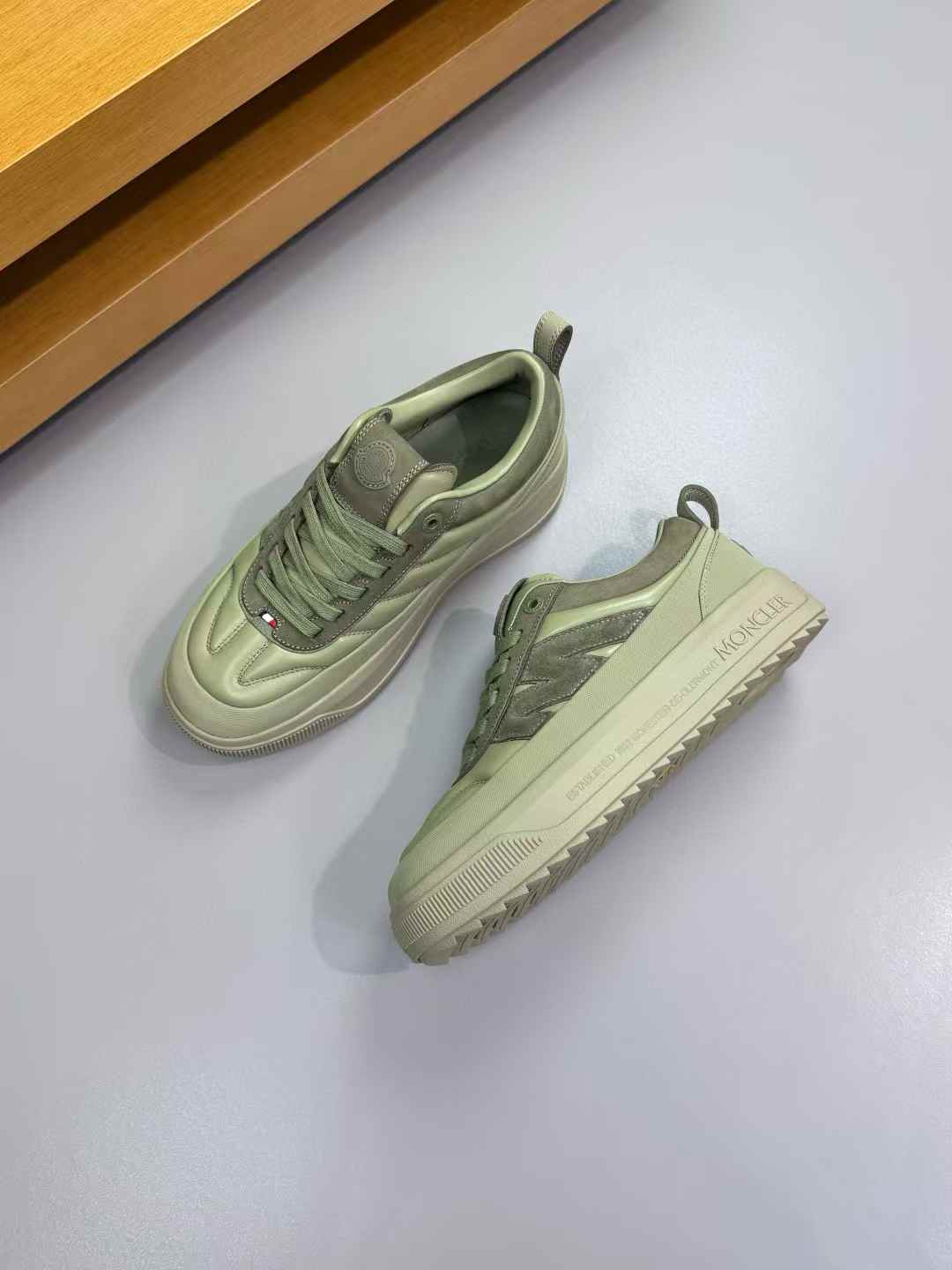 Moncler Altive rubber-sole sneakers in green.