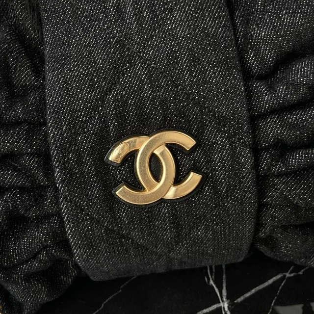 Chanel Maxi Bow Bag in black washed denim with gold-tone metal hardware