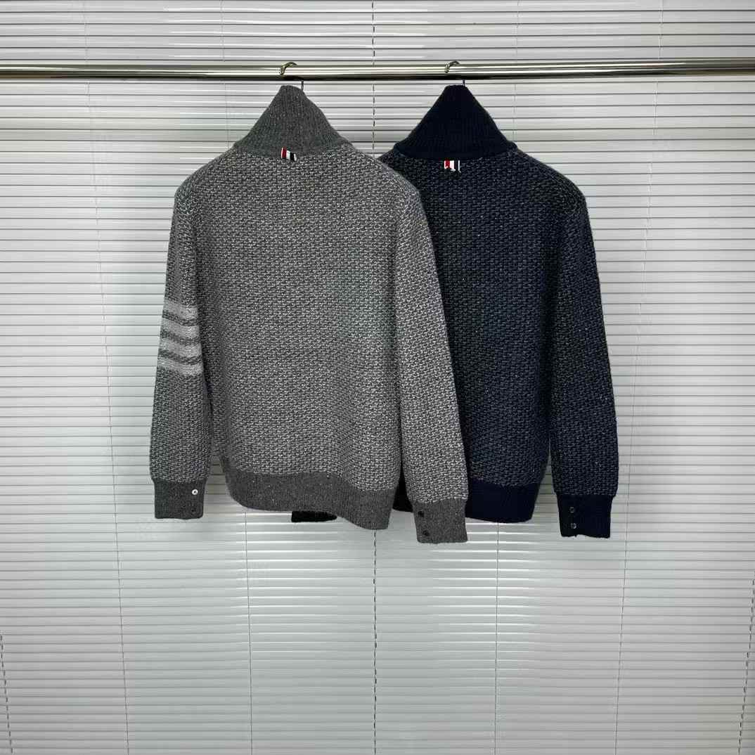 Thom Browne 4-Bar tweed sweater in navy blue and gray.