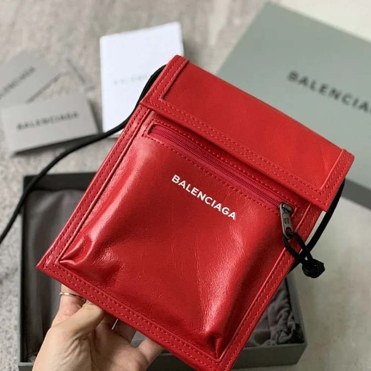 Balenciaga Explorer small pouch bag with strap in red arena lambskin