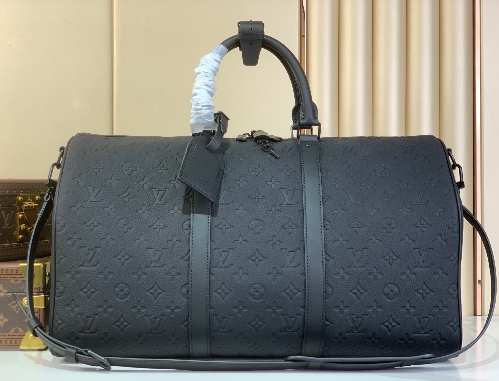 LV Keepall Bandoulière 50 in Monogram Taurillon Leather.
