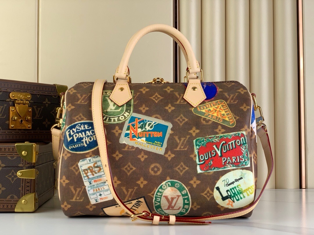 LV Speedy Bandouliere 30 in Monogram canvas with travel stickers