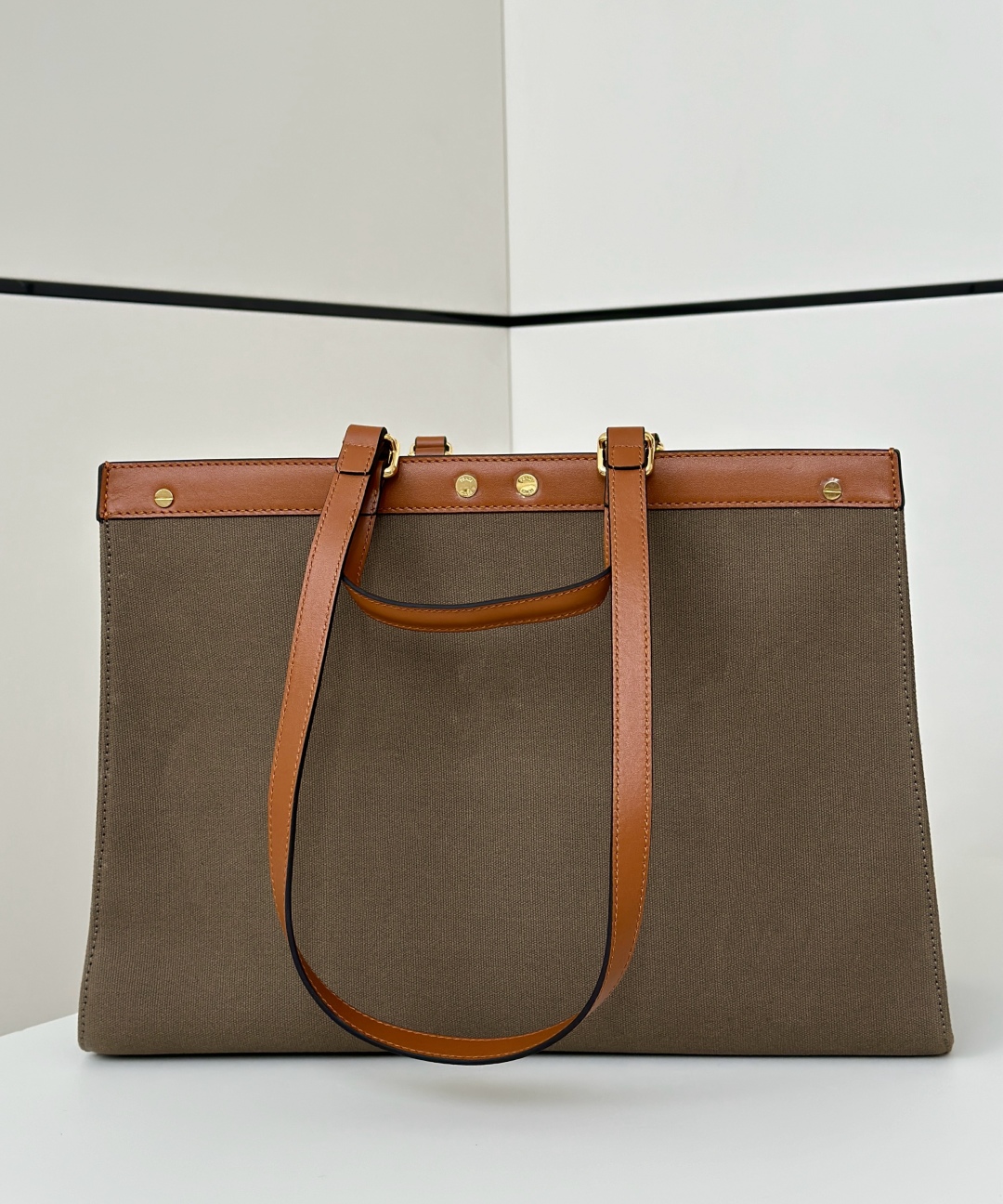 Fendi Peekaboo X-Tote red bag with the FF logo print