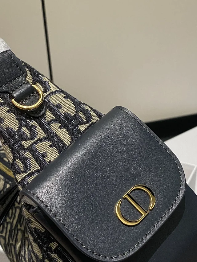 Dior D-Journey bag in blue Dior Oblique jacquard canvas.