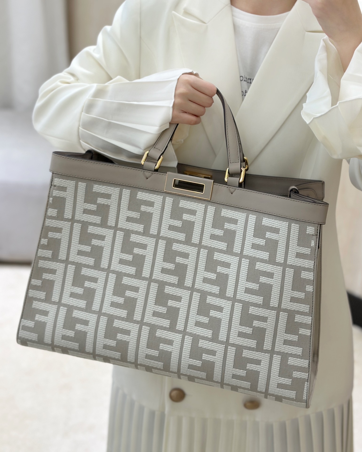 Fendi Peekaboo X-Lite bag in beige canvas with a jacquard FF motif