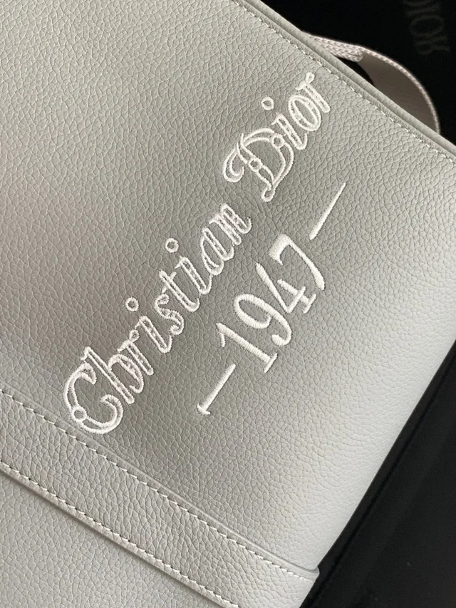 Dior by Birkenstock Christian Dior 1947 Signature Lingot 50 Duffle Bag in Dior Gray grained calfskin.