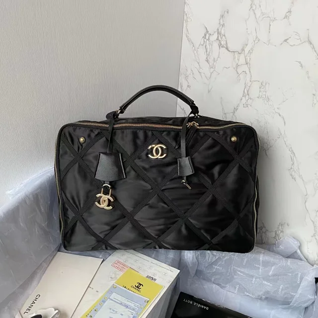 Chanel Nylon Grosgrain Large Lifestyle Travel bag in black.