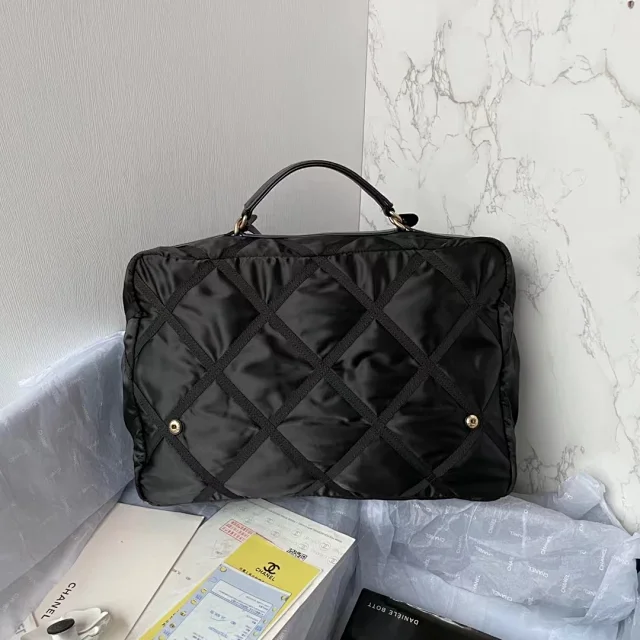 Chanel Nylon Grosgrain Large Lifestyle Travel bag in black.