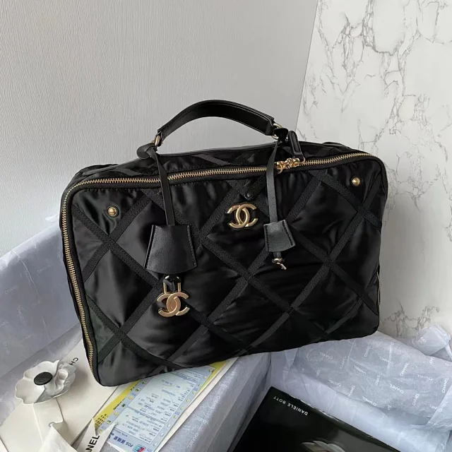 Chanel Nylon Grosgrain Large Lifestyle Travel bag in black.