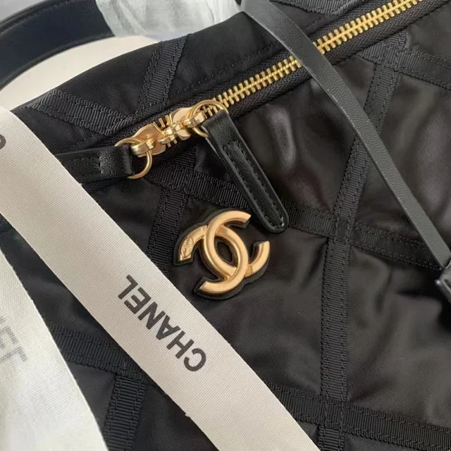 Chanel Nylon Grosgrain Large Lifestyle Travel bag in black.
