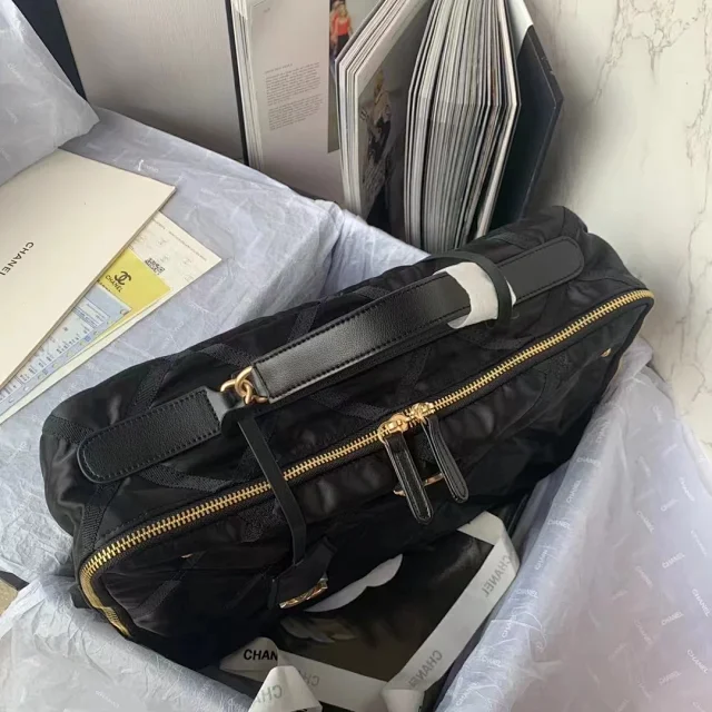 Chanel Nylon Grosgrain Large Lifestyle Travel bag in black.