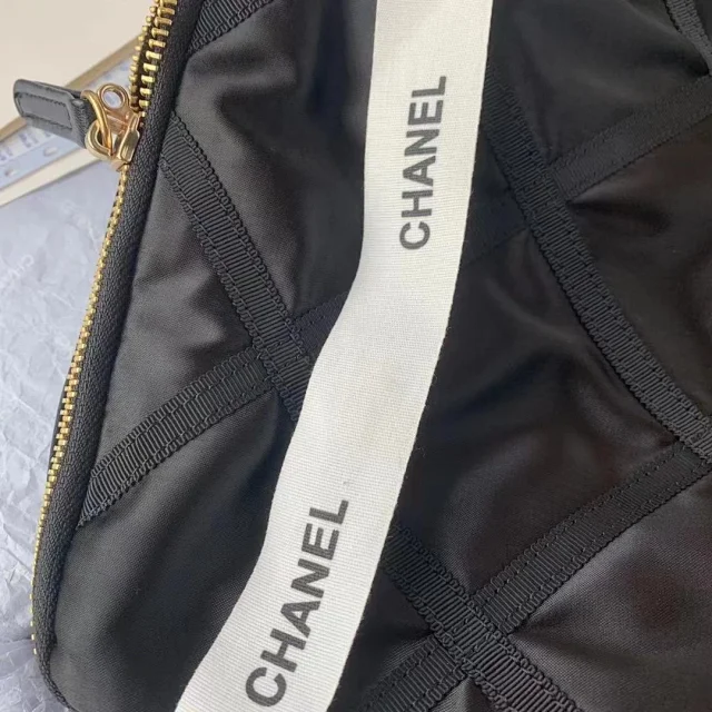 Chanel Nylon Grosgrain Large Lifestyle Travel bag in black.