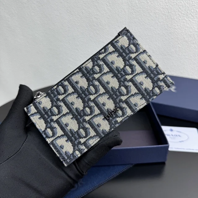 Dior Vertical Bifold Wallet in Dior Gravity leather with the Dior Oblique jacquard canvas