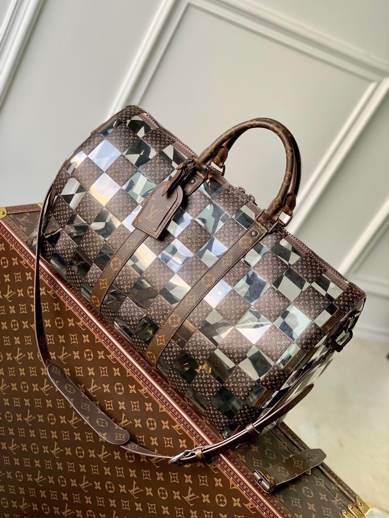 LV Keepall 50 bag in the Monogram Chess or All Over Monogram Checkers design.